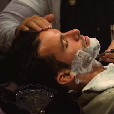 Modern men’s hairstyle by Golden Barber Shop barber